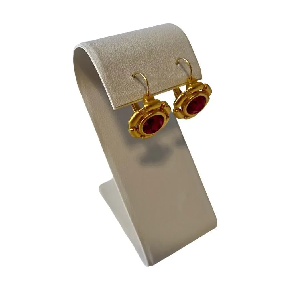 Beautiful pink stone & bright yellow gold toned huggie hoops.